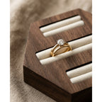 Walnut hexagon ring display stand with three cream velvet-lined channels