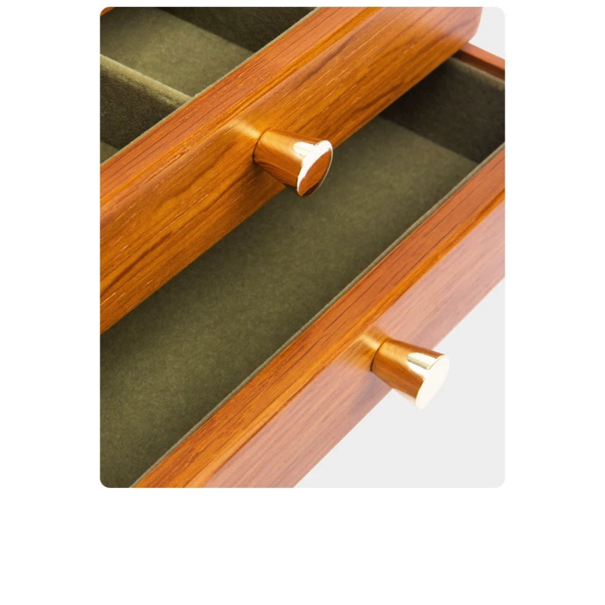 Close-up of round pulls and lined drawers