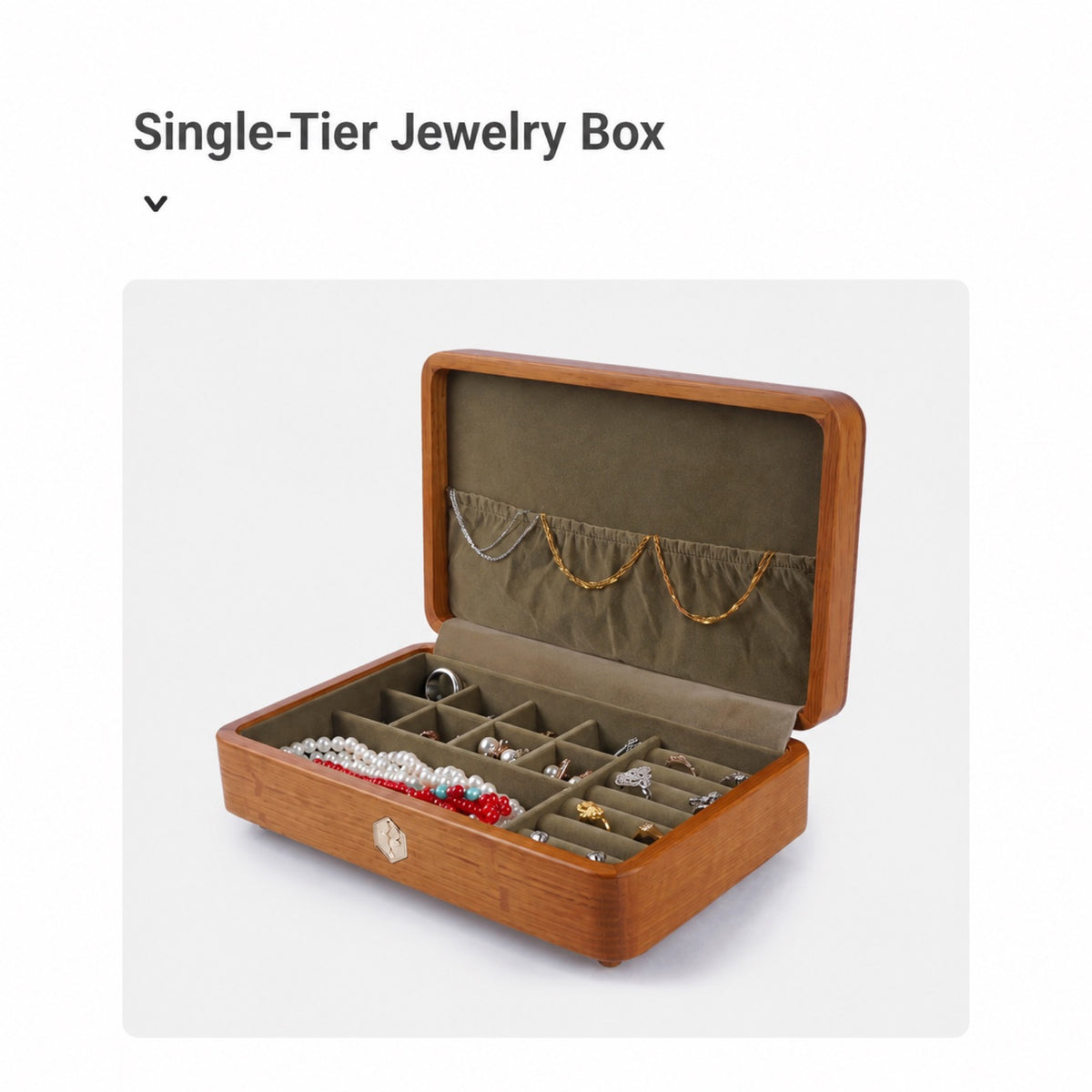Single-tier jewelry box with fabric-lined compartments